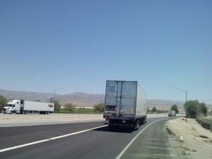 Merging onto the Interstate with semi-trucks was always awkward